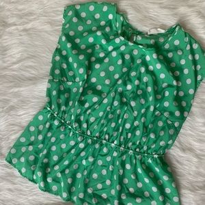 Cheerful polka dot peplum top.